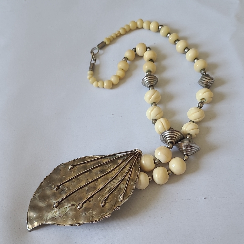 Cream and Silver Nature-Inspired Necklace with Leaf Pendant